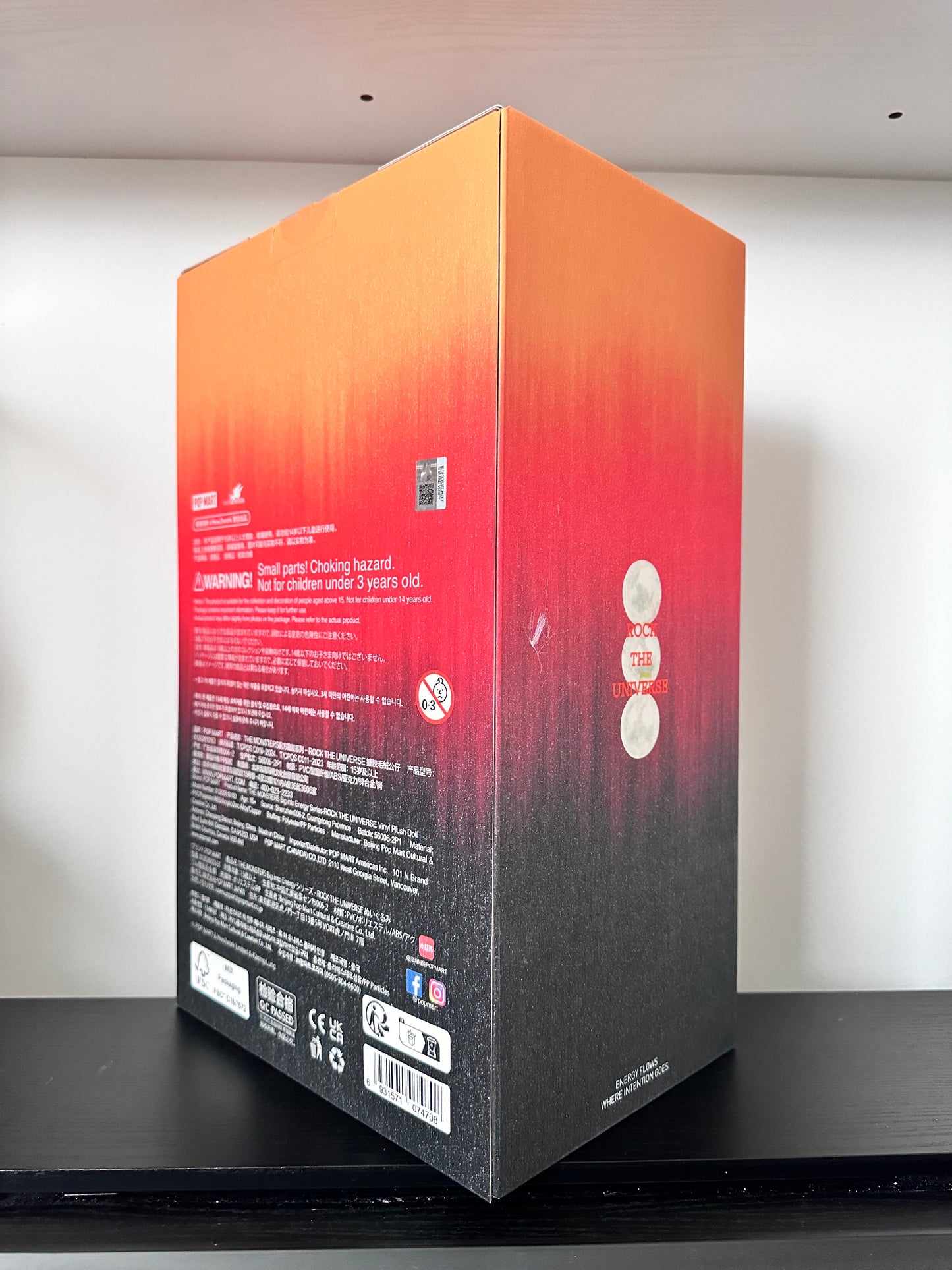 Gradient box with red and black design on a white background