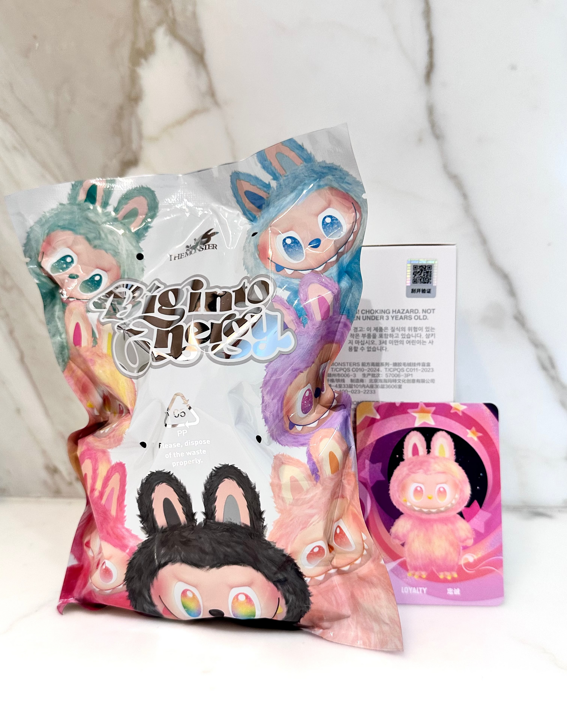 Colorful toy packaging with cartoon characters on a white background