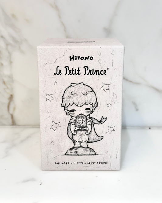 Small box with 'Le Petit Prince' design and Hirono branding on a marble background