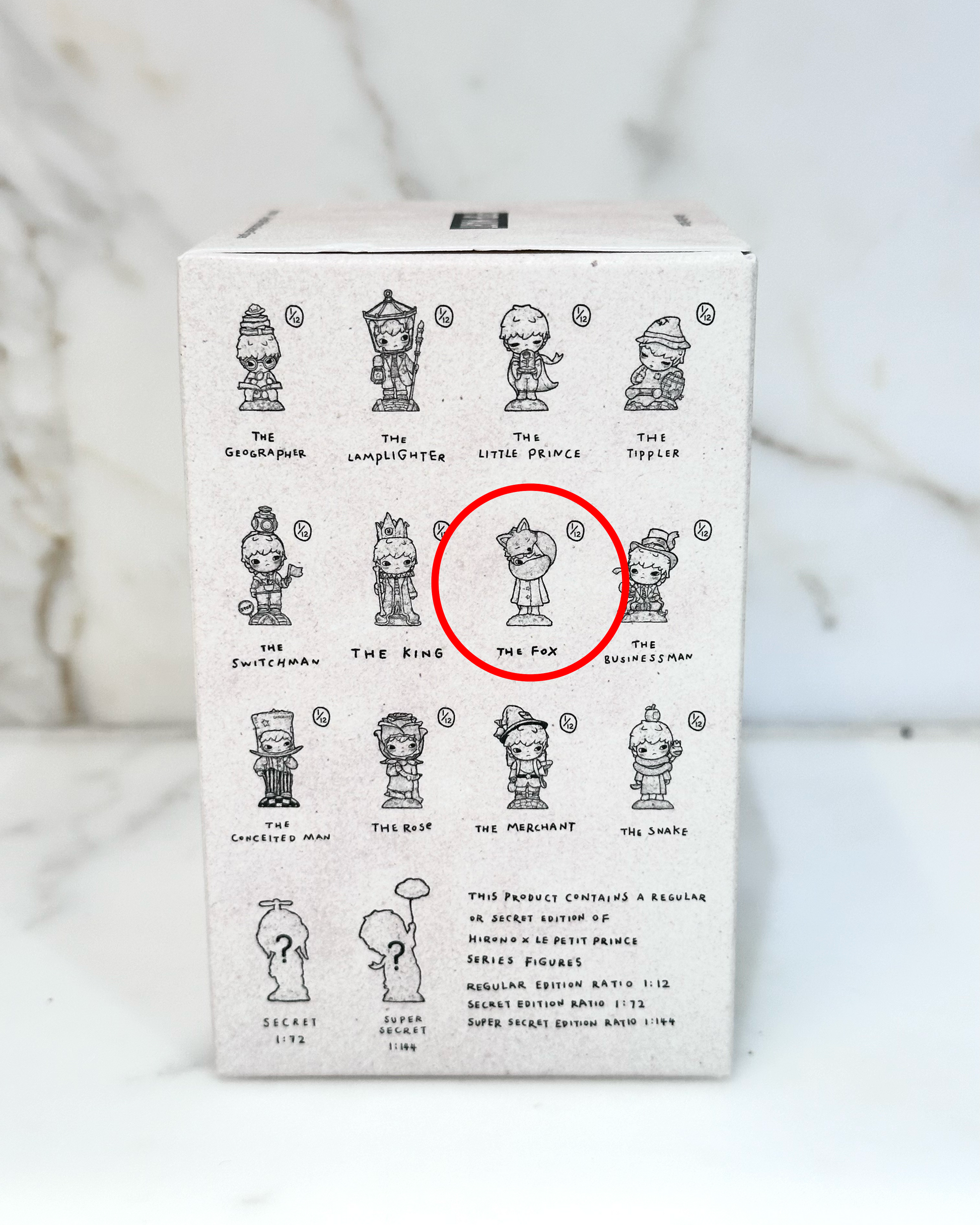 Box with illustrations of characters and a red circle around 'The Fox'.