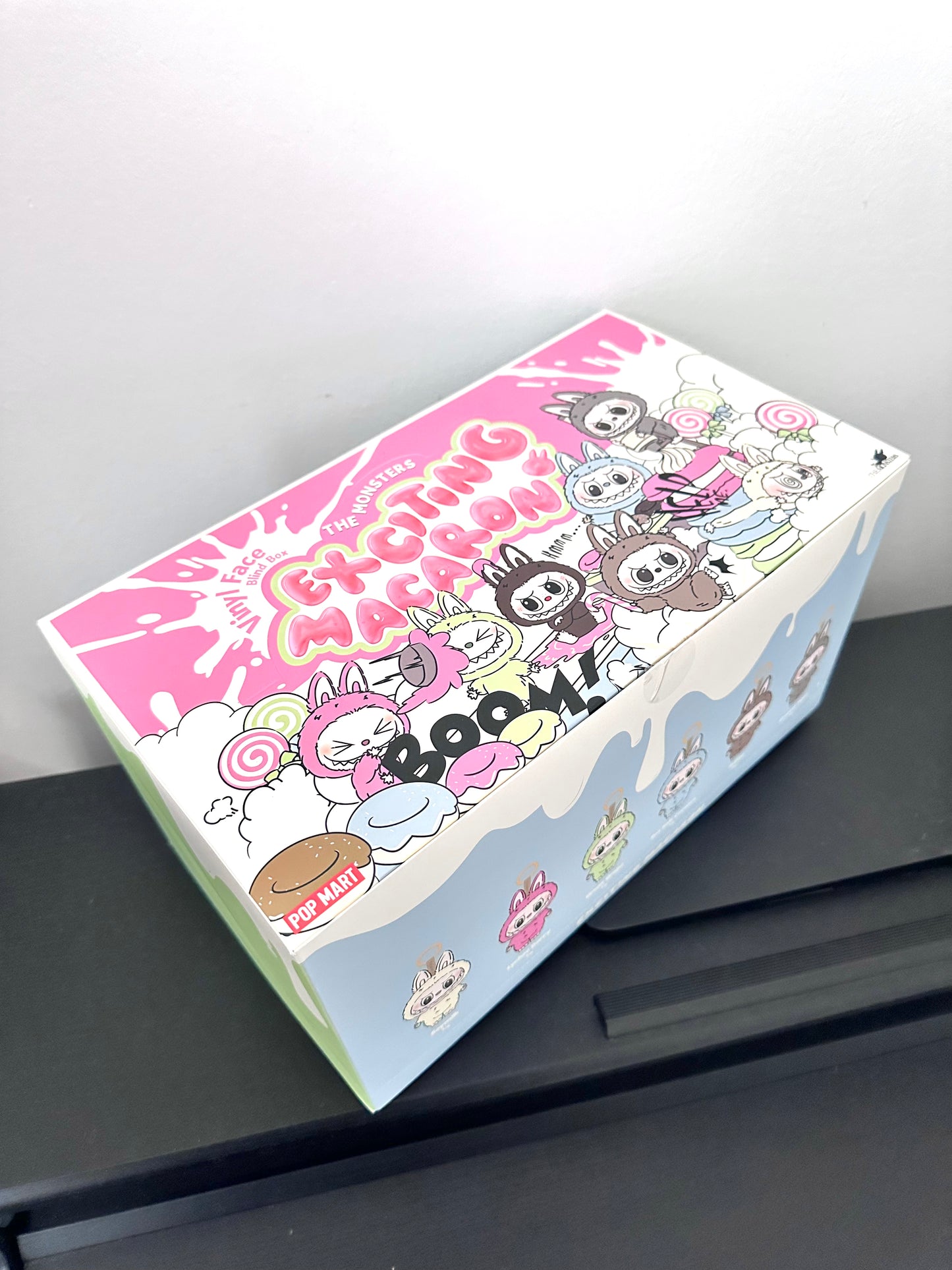 Cartoon-themed box with colorful design on a gray surface