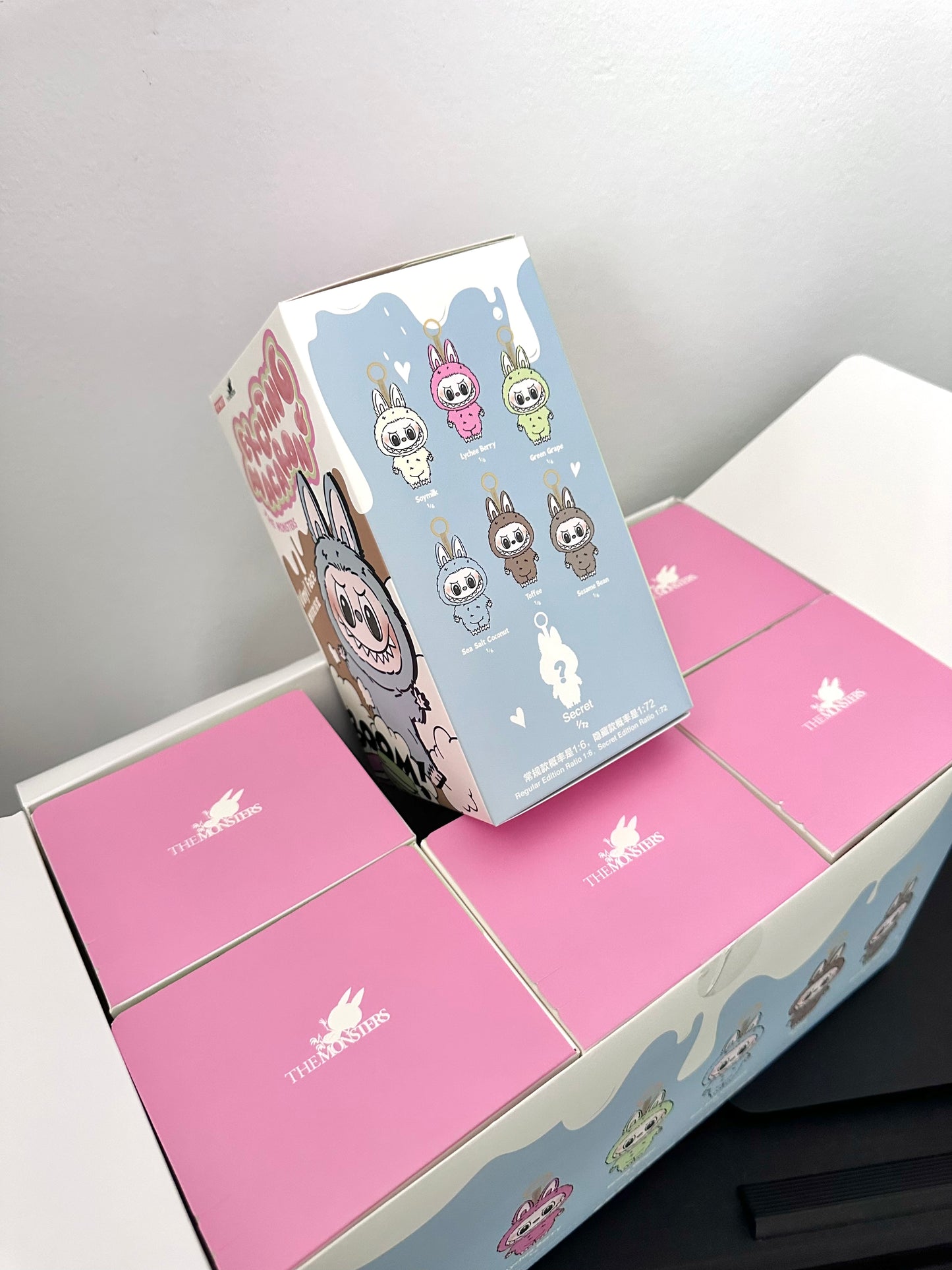 Packaging with cartoon character illustrations on a light gray background