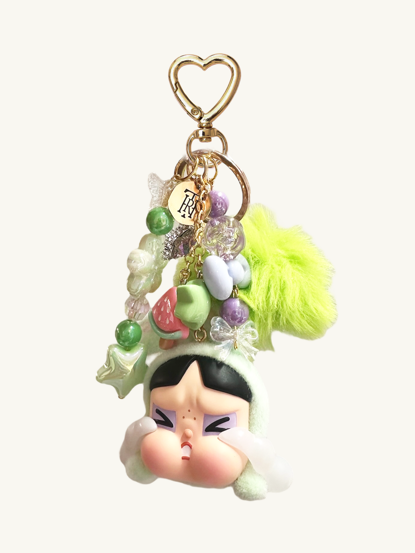 Colorful keychain with a character design on a white background