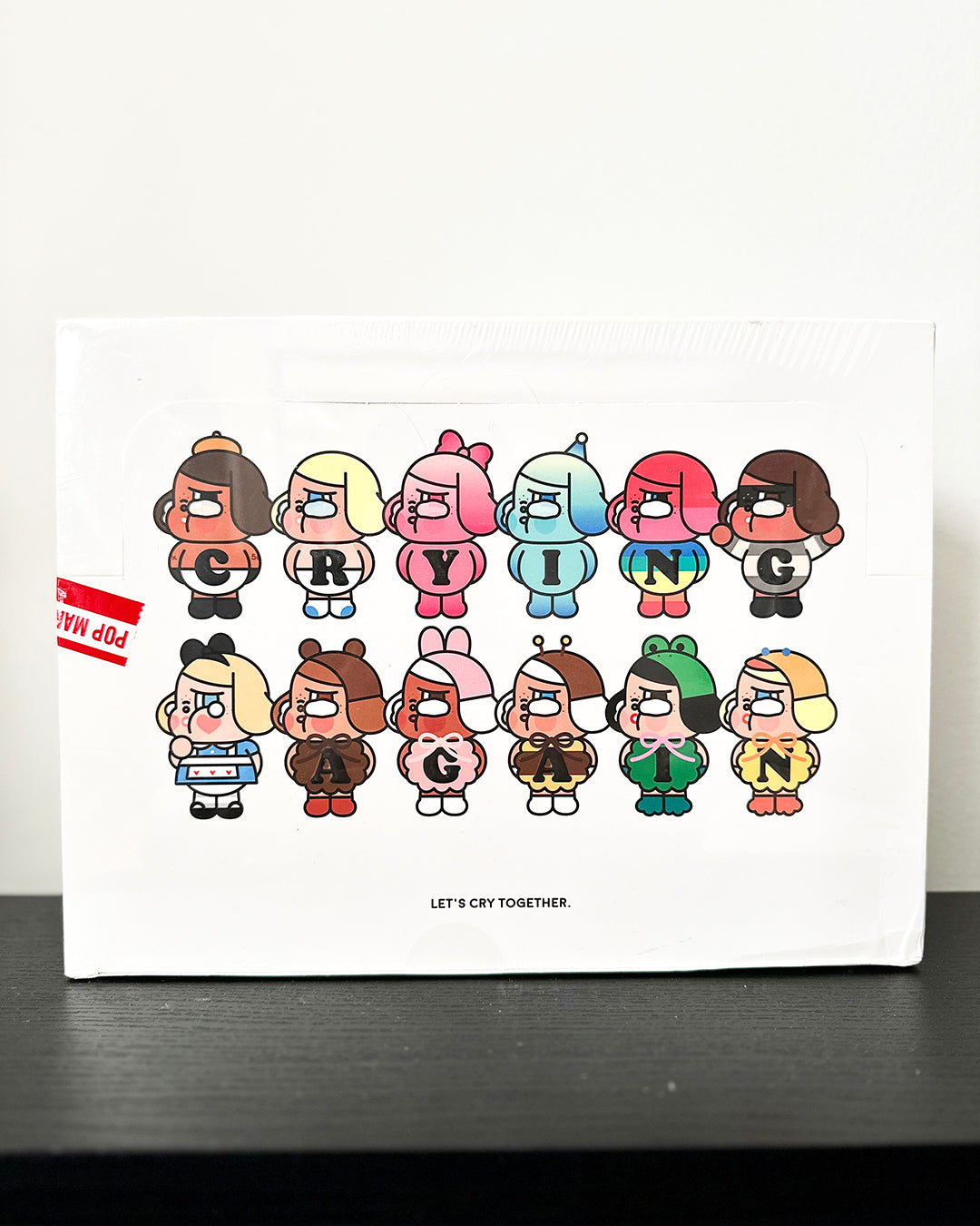 Cartoon characters with colorful clothing on a white background