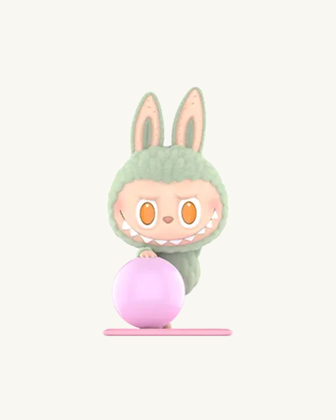 Plush toy with bunny ears and a pink ball on a white background
