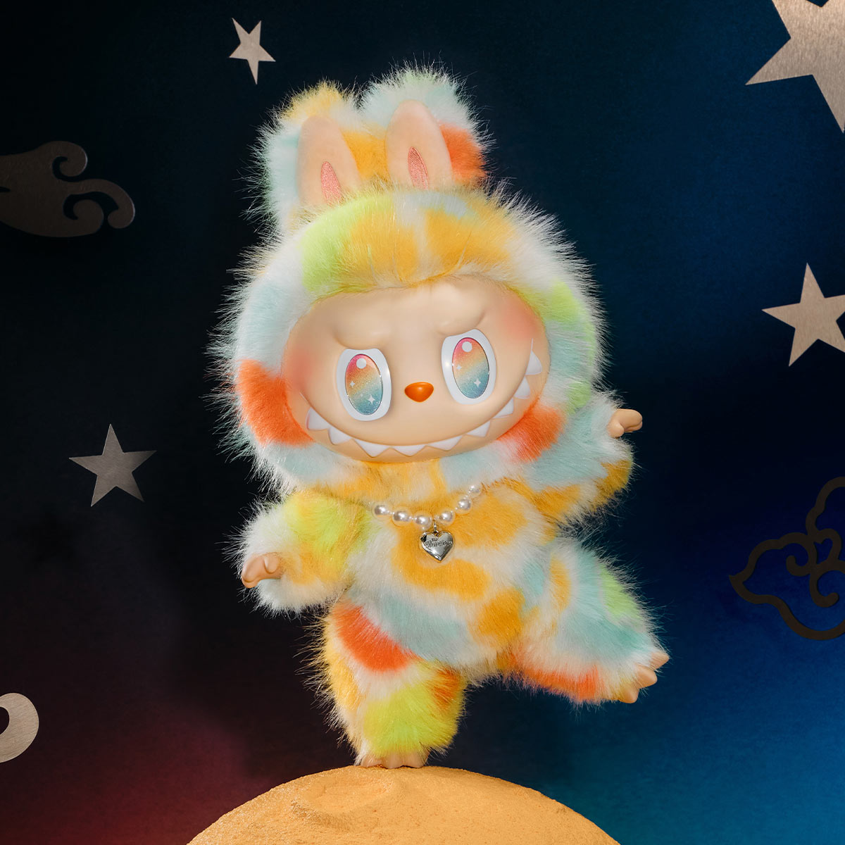 Colorful plush toy with a fuzzy texture on a dark background with stars.