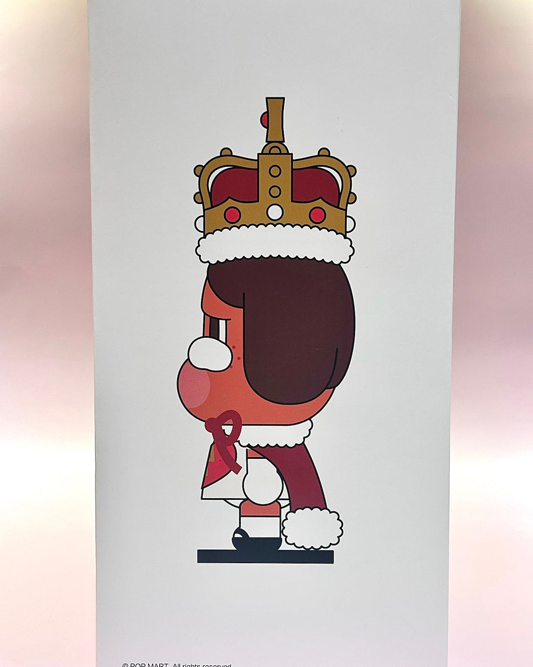 Cartoon character with a crown on a gradient background