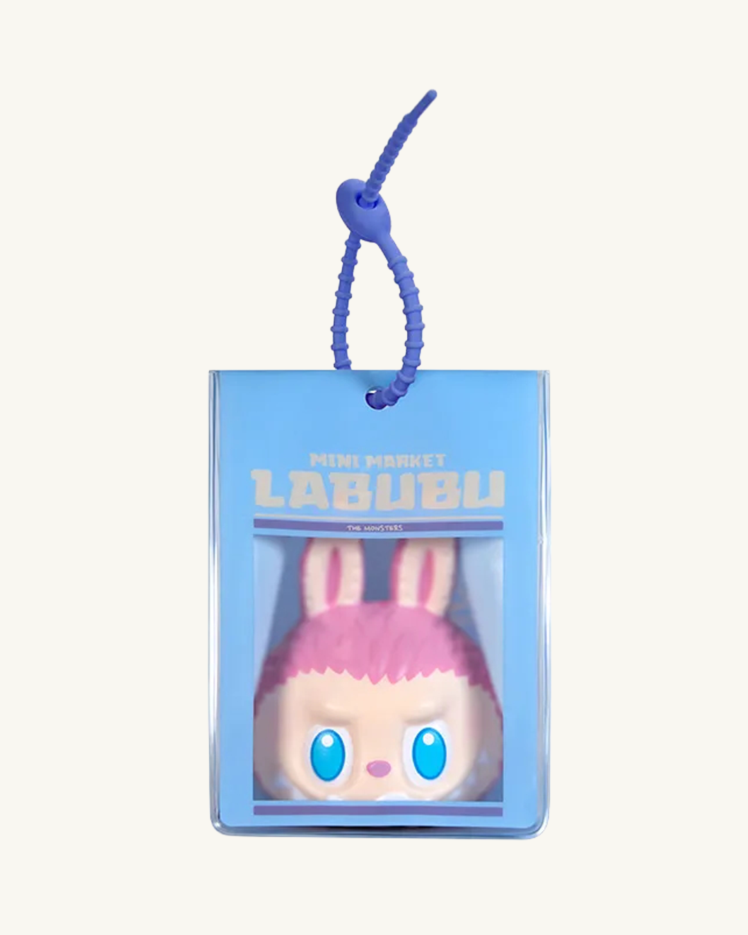 Miniature character with a pink hat and blue eyes in packaging, featuring the brand 'Labubu'.