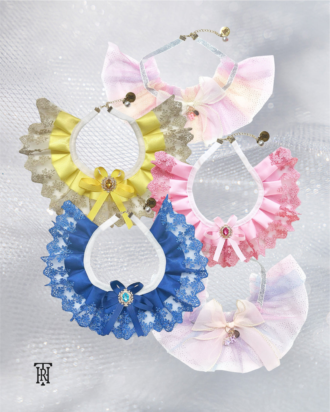 The Haus Royale's lace bib pet collars that comes in blue, pink, and yellow colors.