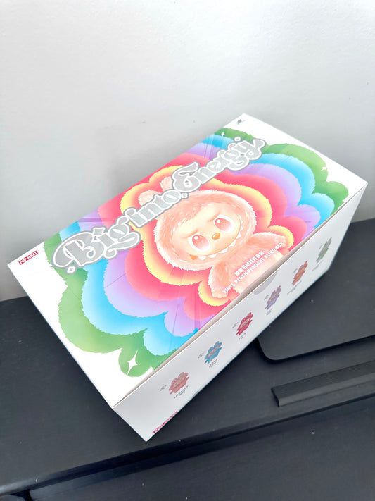 Colorful box with cartoon character on a gray surface