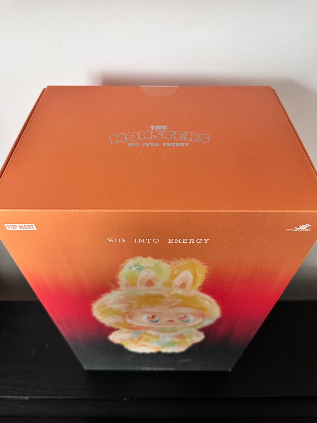 Orange box with a colorful design on a white background