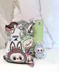 Cartoon character plush toys with packaging on a soft white background