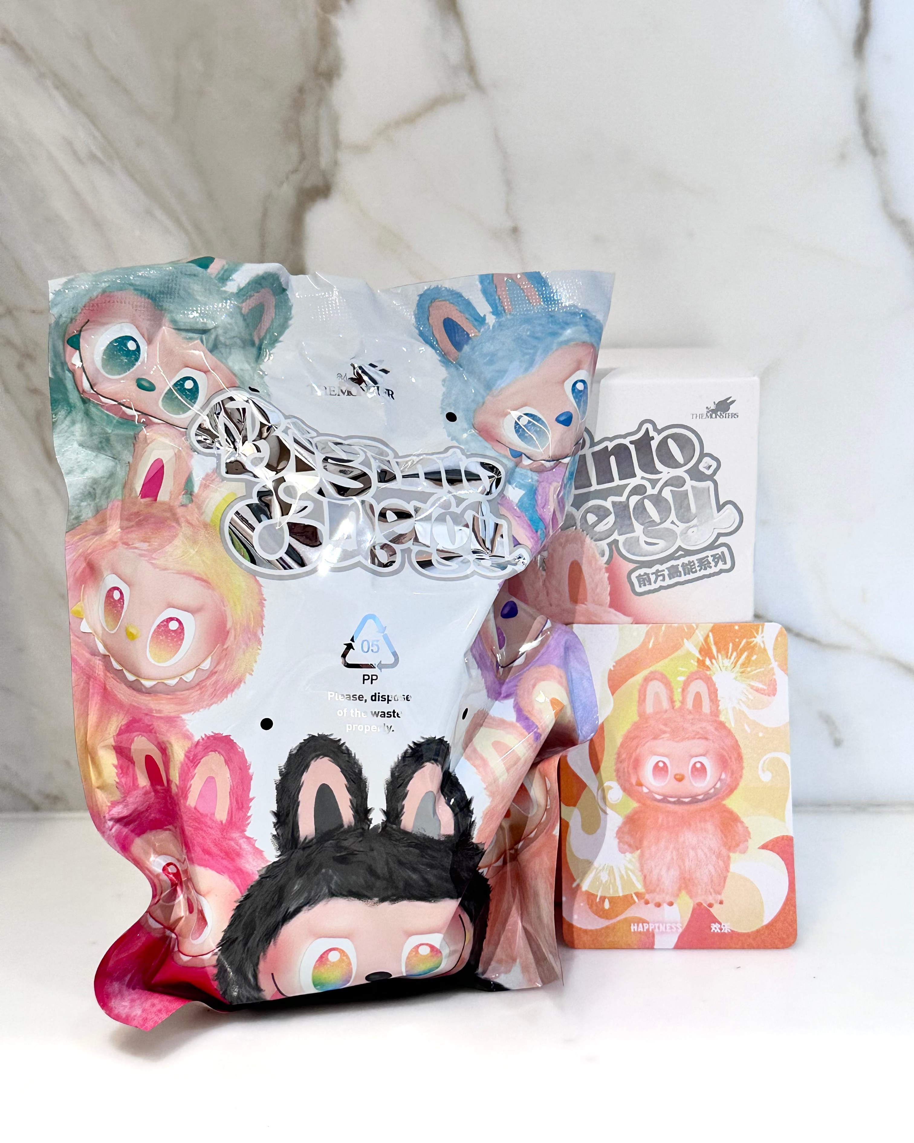 Packaged product with cartoon characters on a marble background