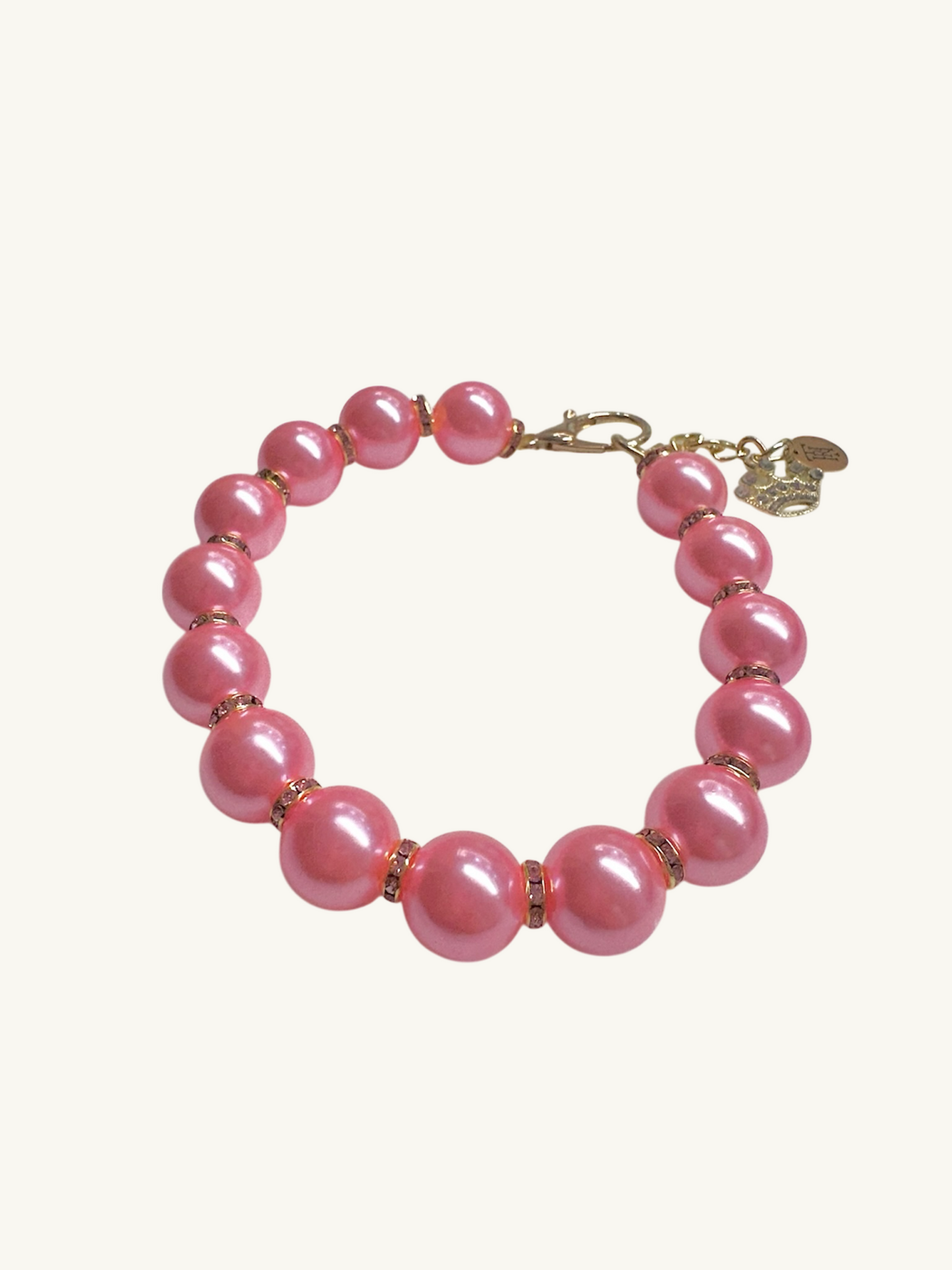 Pink pearl bracelet on a white background