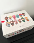 Box with cartoon character designs and text on a white background