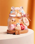 Cute bear-shaped jar with heart-shaped candies on a light orange background