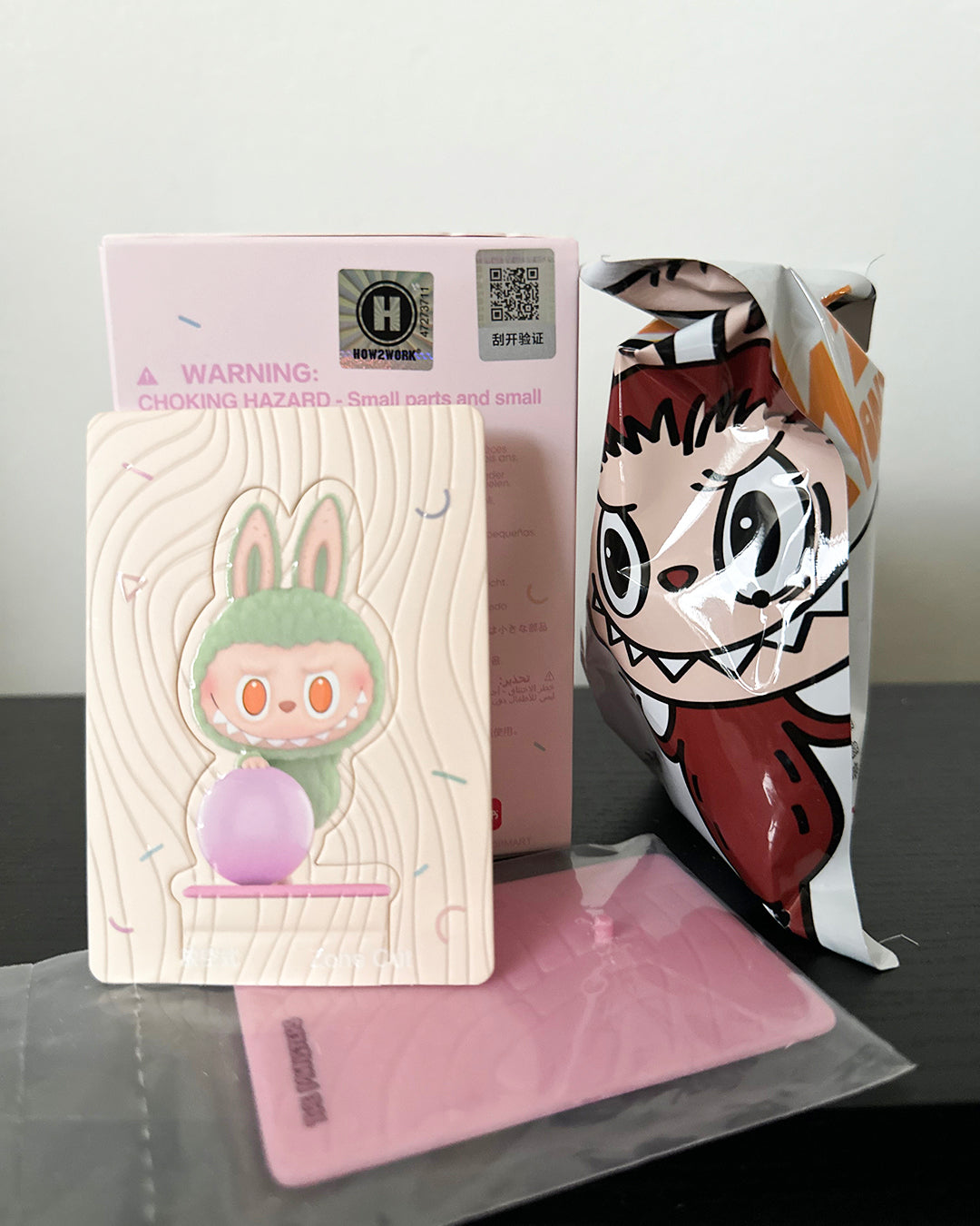 Product packaging with cartoon character design on a reflective surface